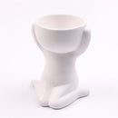 Vaso Decorativo de Cerâmica com design criativo e moderno, ideal para decoração de ambientes.